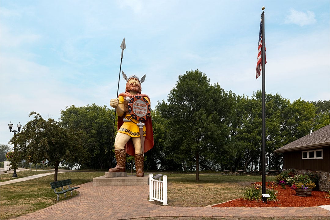 Street view of the Big Ole viking statue just north of downtown Alexandria, MN, on the shore of Lake Agnes